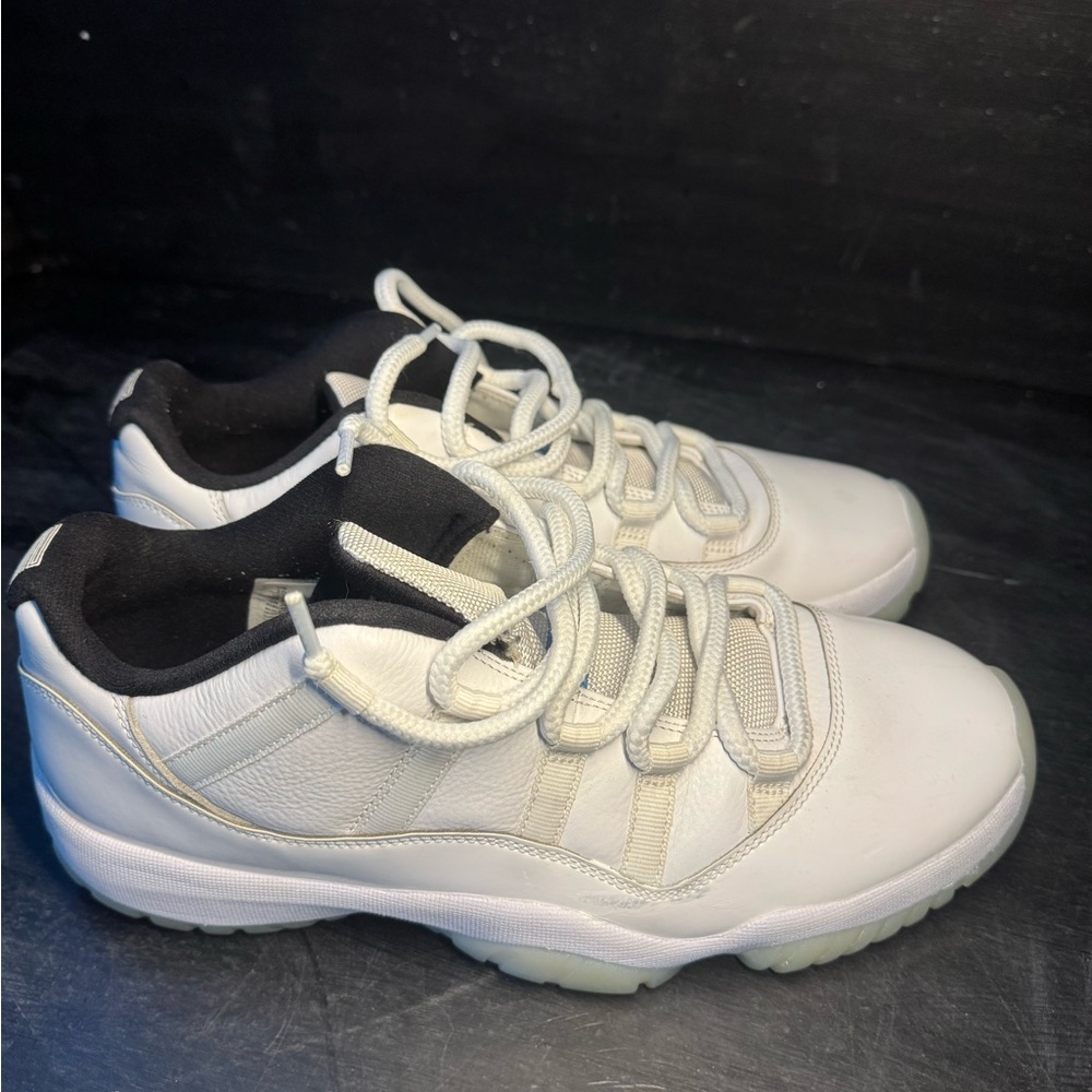 Jordan 11 Low White and Black Athletic Sneakers